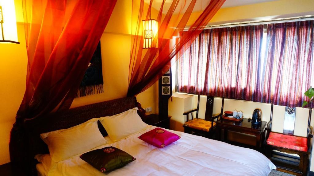 Lijiang Wangjia Courtyard Inn Chambre photo