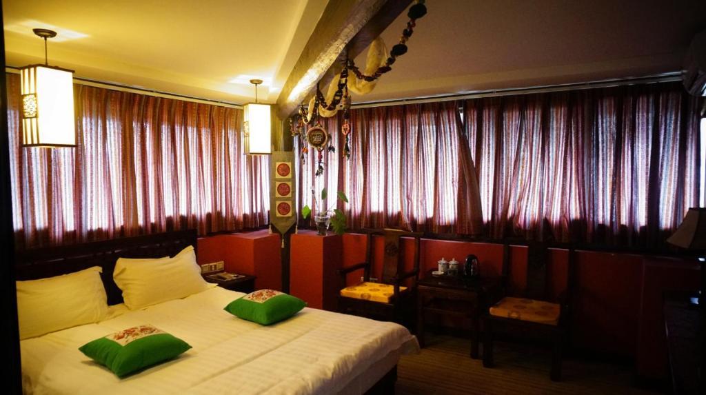 Lijiang Wangjia Courtyard Inn Chambre photo